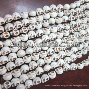 günstigste Großhandel türkis weiß pulver synthetische Howlith Schädel Perlen